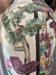A Chinese famille rose 'Spring Festival' vase, 19th C.