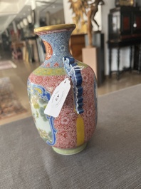 A Chinese falangcai vase with birds among blossoming branches, Qianlong mark, 20th C.