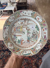 A Chinese octagonal famille rose 'Mandarin acrobat' plate, Qianlong