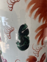 A Chinese famille rose and iron-red vase with a double design of antiquities and Buddhist lions, 19th C.