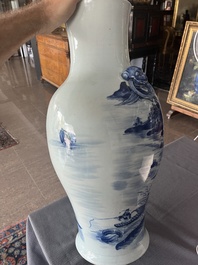A Chinese blue and white baluster vase with an animated river landscape, 19th C.