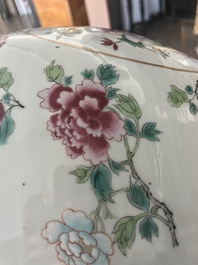 A Chinese famille rose jardini&egrave;re with floral design on a wooden base, 19th C.