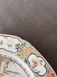 A Chinese octagonal famille rose 'Mandarin acrobat' plate, Qianlong