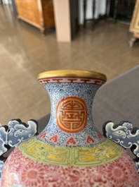 A Chinese falangcai vase with birds among blossoming branches, Qianlong mark, 20th C.