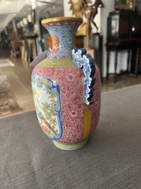A Chinese falangcai vase with birds among blossoming branches, Qianlong mark, 20th C.