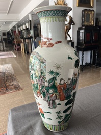 A Chinese famille verte vase with Immortals and their servants in a palace garden, Kangxi mark, 19th C.