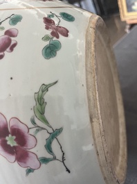 A Chinese famille rose jardini&egrave;re with floral design on a wooden base, 19th C.