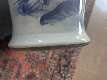 A Chinese blue and white baluster vase with an animated river landscape, 19th C.