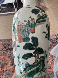 A Chinese famille verte vase with Immortals and their servants in a palace garden, Kangxi mark, 19th C.