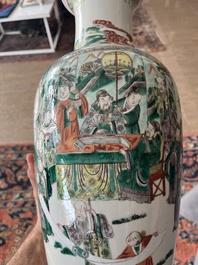 A Chinese famille verte vase with Immortals and their servants in a palace garden, Kangxi mark, 19th C.