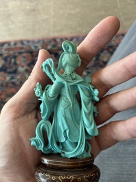 Two Chinese turquoise figures of Lan Caihe and a jade lady figure, 20th C.
