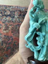 Two Chinese turquoise figures of Lan Caihe and a jade lady figure, 20th C.