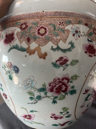 A Chinese famille rose jardini&egrave;re with floral design on a wooden base, 19th C.