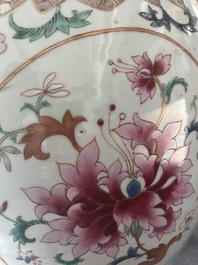 A Chinese famille rose jardini&egrave;re with floral design on a wooden base, 19th C.