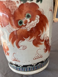 A Chinese famille rose and iron-red vase with a double design of antiquities and Buddhist lions, 19th C.