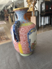 A Chinese falangcai vase with birds among blossoming branches, Qianlong mark, 20th C.
