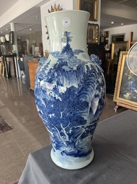 A Chinese blue and white baluster vase with an animated river landscape, 19th C.