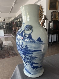 A Chinese blue and white baluster vase with an animated river landscape, 19th C.