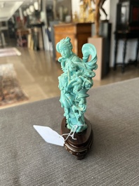 Two Chinese turquoise figures of Lan Caihe and a jade lady figure, 20th C.