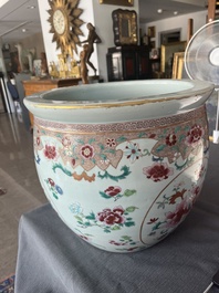 A Chinese famille rose jardini&egrave;re with floral design on a wooden base, 19th C.