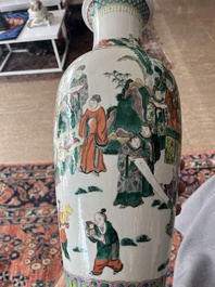 A Chinese famille verte vase with Immortals and their servants in a palace garden, Kangxi mark, 19th C.