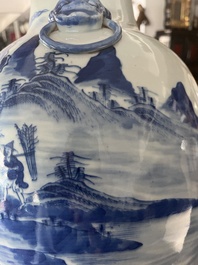A Chinese blue and white baluster vase with an animated river landscape, 19th C.