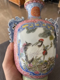A Chinese falangcai vase with birds among blossoming branches, Qianlong mark, 20th C.
