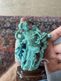 Two Chinese turquoise figures of Lan Caihe and a jade lady figure, 20th C.