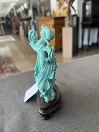Two Chinese turquoise figures of Lan Caihe and a jade lady figure, 20th C.