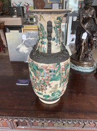 A pair of Chinese Nanking crackle glazed famille verte 'warrior' vases, 19th C.