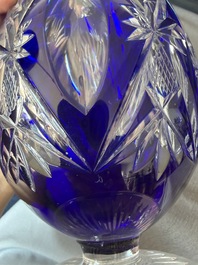 A varied collection of mainly partly coloured overlay cut crystal, a.o. Val Saint Lambert and Atlantis, 20th C.
