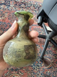 Nine small glass vases and bottles, Roman period and later
