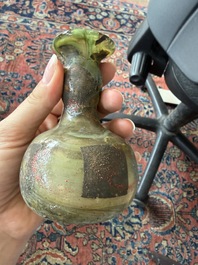Nine small glass vases and bottles, Roman period and later