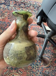 Nine small glass vases and bottles, Roman period and later
