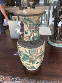 A pair of Chinese Nanking crackle glazed famille verte 'warrior' vases, 19th C.