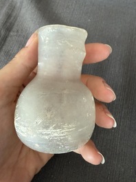 Nine small glass vases and bottles, Roman period and later