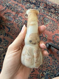 Nine small glass vases and bottles, Roman period and later