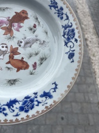 A pair of Chinese famille rose 'fish' plates, Qianlong