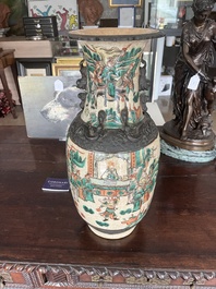 A pair of Chinese Nanking crackle glazed famille verte 'warrior' vases, 19th C.