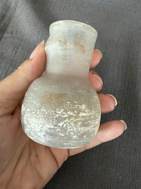Nine small glass vases and bottles, Roman period and later