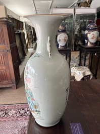 A pair of Chinese famille rose 'animated palace scene' vases, 19th/20th C.