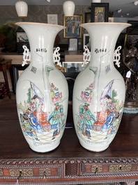 A pair of Chinese famille rose 'animated palace scene' vases, 19th/20th C.