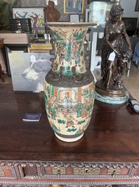 A pair of Chinese Nanking crackle glazed famille verte 'warrior' vases, 19th C.