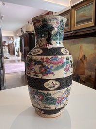 A pair of fine Chinese Nanking crackle glazed famille rose 'warrior' vases, 19th C.
