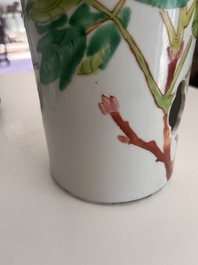 A Chinese reticulated qianjiang cai hatstand with birds among blossoming branches and two famille rose vases with animated design, 19th/20th C.