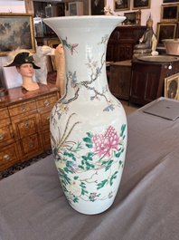 A Chinese famille rose vase with a pheasant and butterflies among blossoming branches, 19th C.
