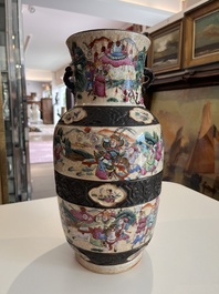 A pair of fine Chinese Nanking crackle glazed famille rose 'warrior' vases, 19th C.