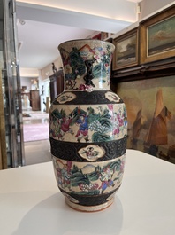 A pair of fine Chinese Nanking crackle glazed famille rose 'warrior' vases, 19th C.
