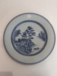 A Chinese blue and white dish with an animated river landscape, Qianlong