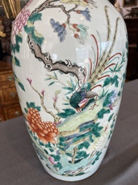 A Chinese famille rose vase with a pheasant and butterflies among blossoming branches, 19th C.